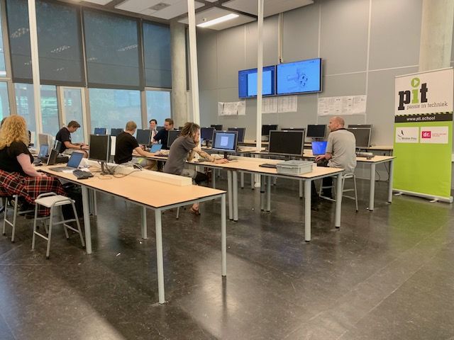 Deelnemers volgen training Fusion